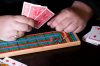 BROOK JONES / WINNIPEG FREE PRESS
Thirty-five-year-old Lyndon Demers, who is passionate about cribbage, showcases a cribbage board as he hosts Lyndon's Cribbage Nights every second Wednesday from 6:30 to 9 p.m. on the second floor of Heather Curling Club at 120 Youville Street. As many as 20 enthusiatic cribbage players gather for the cribbage nights, rotating opponents as the evening goes along. Demers was pictured at the Heather Curling Club in Winnipeg, Man., Wednesday, Oct. 25, 2023.