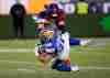 Winnipeg Blue Bombers running back Brady Oliveira (20) is tackled by Montreal Alouettes defensive back Marc-Antoine Dequoy (24) during the second half of football action at the 110th CFL Grey Cup in Hamilton, Ont., on Sunday, November 19, 2023. THE CANADIAN PRESS/Frank Gunn