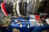 MIKAELA MACKENZIE / WINNIPEG FREE PRESS
                                RCMP displayed seized luxury clothing and shoes, along with pistols, shotguns and computer equipment, at a news conference Tuesday in Winnipeg.