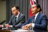 MIKAELA MACKENZIE / WINNIPEG FREE PRESS
                                Premier Wab Kinew (right) and finance minister Adrien Sala speak to the media about the finances left to them by the previous Conservative government at the Manitoba Legislative Building on Tuesday.