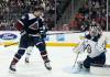 (AP Photo/David Zalubowski)
                                Colorado Avalanche defenceman Kurtis MacDermid, left, has his shot stopped by Winnipeg Jets goaltender Connor Hellebuyck during the first period Thursday, in Denver.