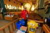 &ldquo;It&rsquo;s a good example to show the kids how to help other people,&rdquo; says Johnny Ortizo, with donations for a food drive for Harvest Manitoba at St. Edward the Confessor Church. (Mike Deal / Winnipeg Free Press)