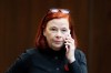 CBC President and CEO Catherine Tait talks on a cellphone before appearing at the Standing Committee on Canadian Heritage in Ottawa, on Thursday, Nov. 2, 2023. Canadian Heritage Minister Pascale St. Onge says the government will convene a committee early in the new year to begin searching for Tait's replacement's as the head of CBC/Radio-Canada.THE CANADIAN PRESS/Spencer Colby