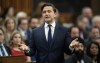 Leader of the Conservative Party Pierre Poilievre rises during Question Period, Tuesday, December 12, 2023 in Ottawa. A man who initially sought the Conservative nomination for a Greater Toronto Area riding has instead won a contest to become the Liberal candidate in an upcoming byelection. THE CANADIAN PRESS/Adrian Wyld