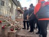 KATRINA CLARKE / WINNIPEG FREE PRESS
Beverley Beardy takes in the memorial at the site of a shooting last weekend that claimed the lives of her two daughters, Crystal and Stephanie Beardy. A vigil for the four people killed in the shooting was held Sunday afternoon, Dec. 4, 2023.