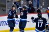 THE CANADIAN PRESS/Fred Greenslade
                                Winnipeg Jets&rsquo; Gabriel Vilardi celebrates a goal against the New York Islanders with teammates Dylan Demelo and Adam Lowry during the first period Tuesday.