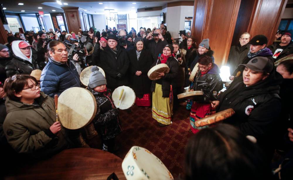 JOHN WOODS / WINNIPEG FREE PRESS
                                Assembly of Manitoba Chiefs Grand Chief Cathy Merrick and Grand Chief Garrison Settee, Manitoba Keewatinowi Okimakanak (MKO) gather with people in the lobby of the Marlborough Hotel on Sunday.