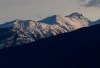 A helicopter flies past a mountain near McBride, B.C., on Saturday January 30, 2016. Environment Canada is warning parts of northern British Columbia to expect wind chill values as cold as -50 C for at least the rest of the week. THE CANADIAN PRESS/Darryl Dyck
