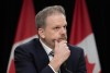 Minister of Health Mark Holland listens to a question from a reporter during a news conference, Tuesday, Dec. 12, 2023, in Ottawa. THE CANADIAN PRESS/Adrian Wyld