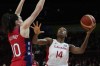 Canada's Kayla Alexander, right, lays up for a shot at goal as United States' Breanna Stewart attempts to block during their semifinal game at the women's Basketball World Cup in Sydney, Australia, Friday, Sept. 30, 2022. Alexander led the way with 15 points and 13 rebounds as Canada took a 67-55 opening win over host Hungary on Thursday in a FIBA Olympic Qualifying tournament.THE CANADIAN PRESS/AP-Mark Baker