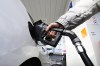 Canadian families will get between $760 and $2,160 in carbon price rebates this year as the carbon price itself gets hiked another $15 per tonne. A person pumps gas at a gas station in Mississauga, Ont., Tuesday, February 13, 2024. THE CANADIAN PRESS/Christopher Katsarov