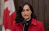 Treasury Board President Anita Anand speaks with reporters before Question Period, in Ottawa, Monday, Feb. 26, 2024. THE CANADIAN PRESS/Adrian Wyld