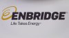 The Enbridge logo is shown at the company's annual meeting in Calgary on May 9, 2018. Enbridge Inc. announced about US$500 million in new projects to grow its business in the U.S. including its export terminal in Texas and an expansion of its Gray Oak pipeline which carries oil from the Permian Basin to the U.S. Gulf Coast. THE CANADIAN PRESS/Jeff McIntosh