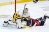 JOHN WOODS / THE CANADIAN PRESS
Penguins goaltender Tristan Jarry leans on Winnipeg forward Nino Niederreiter before letting him get up during third-period action at Canada Life Centre Saturday.