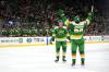 Abbie Parr / The Associated Press
                                Minnesota Wild defenceman Declan Chisholm (left) celebrates Saturday after scoring the first goal of his NHL career against the Buffalo Sabres.