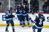 FRED GREENSLADE / THE CANADIAN PRESS
                                Nino Niederreiter (left) Mason Appleton and Adam Lowry are joined by blue-liner Brenden Dillon as they celebrate Appletons goal Tuesday against the Minnesota Wild.