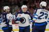 (AP Photo/Erin Hooley)
                                Winnipeg Jets from left, Alex Iafallo, Nikolaj Ehlers and Sean Monahan celebrate Ehlers&rsquo; goal against the Chicago Blackhawks during the first period Friday in Chicago.