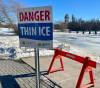 RUTH BONNEVILLE / WINNIPEG FREE PRESS Weather Photo of Thin Ice, sign at Assiniboine Park Duck pond. Above normal January temperatures causing closure of skating ponds and rinks.
