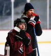 JOHN WOODS / FREE PRESS
Winnipeg Jets’ Morgan Barron (36) and Kaioeen Monias, who plays right wing, listen in as head coach Nicole McAlpine talks to her team at a U-15 girls practice at Camp Morton Monday, February 26, 2024. The Jets are running a program where players pair up and attend some of the practices and games to help mentor/coach young players. 

Reporter: mike