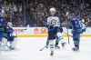 Winnipeg Jets' Sean Monahan, centre, celebrates his goal against Vancouver Canucks goalie Thatcher Demko, back left, as Elias Lindholm (23) looks on during the second period of an NHL hockey game in Vancouver, on Saturday, February 17, 2024. THE CANADIAN PRESS/Darryl Dyck
