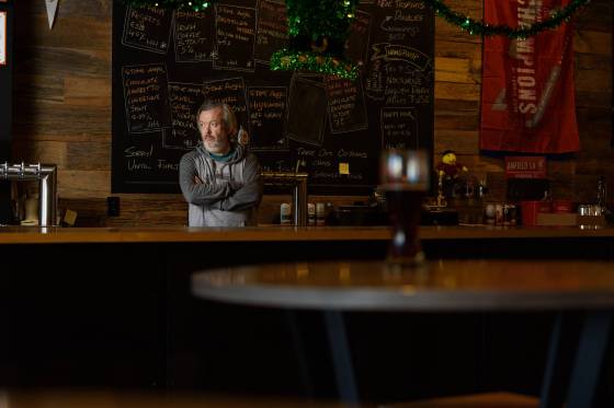 Paul Clerkin, an owner of Stone Angel Brewing Co., sits inside his brewery and tap house in 2020. (Jesse Boily / Free Press files)