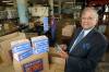 MIKE APORIUS/WINNIPEG FREE PRESS Nutty Club- Murray&rsquo;s story Nutty Club President Jim Burt looks over boxes being shipped at the Alexander Street plant. July 07/2003