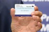 KEVIN KING / POOL

Premier Brian Pallister holds a vaccination card during a press briefing on vaccine measures at the Manitoba Legislative Building in Winnipeg on Tues., June 8, 2021.