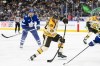 Boston Bruins right wing David Pastrnak (88) shoots while Toronto Maple Leafs right wing Ryan Reaves (75) looks on during second period NHL hockey action, in Toronto on Saturday, Dec. 2, 2023. The playoffs begin Saturday with the Toronto Maple Leafs taking on the Boston Bruins in opening-round action.THE CANADIAN PRESS/Christopher Katsarov