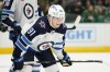 Winnipeg Jets center Cole Perfetti (91) watches a face off during an NHL hockey game against the Dallas Stars in Dallas on February 29, 2024. THE CANADIAN PRESS/AP, Tony Gutierrez