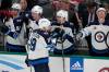 Tony Gutierrez / The Associated Press
                                Winnipeg Jets&rsquo; David Gustafsson celebrates with the bench after scoring in the second period in Dallas, Thursday.