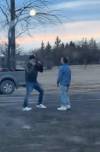 SUPPLIED
                                Two men square off in the parking lot of an East St. Paul convenience store Wednesday night.