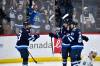THE CANADIAN PRESS/Fred Greenslade
                                Winnipeg Jets&rsquo; Kyle Connor celebrates his goal against the Seattle Kraken with Mark Scheifele and Gabriel Vilardi during the first period in Winnipeg on Tuesday.