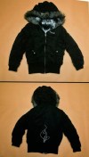 An evidence photo of a Baby Phat branded jacket is shown at a news conference for an ongoing homicide investigation in Winnipeg, Thursday, Dec. 1, 2022. THE CANADIAN PRESS/John Woods