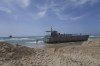 A U.S. Army landing craft is seen beached in Ashdod on Sunday, May 26, 2024, after being swept by wind and current from the temporary humanitarian pier in the Gaza Strip. (AP Photo/Tsafrir Abayov)
