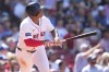 Boston Red Sox's Rafael Devers watches the flight of his two-run home run in the seventh inning of a baseball game against the Atlanta Braves, Wednesday, June 5, 2024, at Fenway Park in Boston. (AP Photo/Charles Krupa)