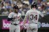 Detroit Tigers' Justyn-Henry Malloy celebrates with Jake Rogers (34) after hitting a solo home run against the Texas Rangers, his first hit in the majors, during the sixth inning of a baseball game Wednesday, June 5, 2024, in Arlington, Texas. (AP Photo/Tony Gutierrez)
