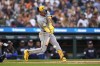Milwaukee Brewers' Joey Ortiz (3) hits a two-run single against the Detroit Tigers in the second inning of a baseball game, Friday, June 7, 2024, in Detroit. (AP Photo/Paul Sancya)