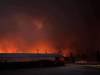 Cranberry Portage was evacuated Saturday night, as a wildlife spread close to the northern community. (Heather Charlette / Facebook)