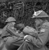 LIBRARY AND ARCHIVES CANADA
                                Soldiers debrief after a day patrol in Normandy on June 12. The Rifles continued to face hostilities in the days after D-Day.