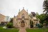 BROOK JONES / FREE PRESS Holy Trinity Church at 256 Smith St. in Winnipeg, Man., that was built in 1983-84 as a long cruciform-shaped stone structure is pictured Friday, May 24, 2024. The church parish has request permission of the Diocese of Rupter&rsquo;s Land to sell the Victoria-era Gothic Revial architecturally designed church.