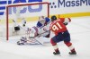 Florida Panthers defenseman Oliver Ekman-Larsson (91) attempts a shot at New York Rangers goaltender Igor Shesterkin (31) in the first period of Game 3 during the Eastern Conference finals of the NHL hockey Stanley Cup playoffs, Sunday, May 26, 2024, in Sunrise, Fla. (AP Photo/Wilfredo Lee)