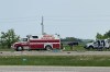 Emergency crews respond to the scene that closed a section of the Trans-Canada Highway near Carberry, Man., on Thursday, June 15, 2023. The year that has passed since the crash killed 17 seniors headed to a casino has been one of grief, community support, a slow return to normal and, for some, a long road to recovery. THE CANADIAN PRESS/Steve Lambert