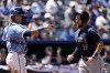 Seattle Mariners' Tyler Locklear runs home to score on a single by Josh Rojas during the seventh inning of a baseball game against the Kansas City Royals Sunday, June 9, 2024, in Kansas City, Mo. (AP Photo/Charlie Riedel)