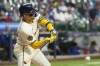 Milwaukee Brewers' William Contreras hits a single during the sixth inning of a baseball game against the Toronto Blue Jays Monday, June 10, 2024, in Milwaukee. (AP Photo/Morry Gash)