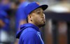 New York Mets Edwin Diaz looks out from the dugout during the seventh inning of a baseball game against the Miami Marlins, Tuesday, June 11, 2024, in New York. (AP Photo/Noah K. Murray)