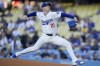 Los Angeles Dodgers starting pitcher Walker Buehler throws during the first inning of a baseball game against the Texas Rangers, Wednesday, June 12, 2024, in Los Angeles. (AP Photo/Ryan Sun)