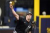 FILE - New York Yankees pitcher Gerrit Cole throws a bullpen session before the team's baseball game against the Tampa Bay Rays, May 11, 2024, in St. Petersburg, Fla. Cole struck out 10 in 4 1/3 innings for Triple-A Scranton-Wilkes Barre on Friday night, June 14, the reigning AL Cy Young Award winner’s third rehab start and the latest step toward returning to the Yankees’ rotation.(AP Photo/Chris O'Meara, File)