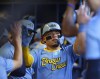 Milwaukee Brewers' William Contreras is congratulated for his home run against the Cincinnati Reds during the third inning of a baseball game Friday, June 14, 2024, in Milwaukee. (AP Photo/Jeffrey Phelps)