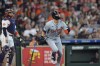 Detroit Tigers' Riley Greene (31) drops his bat after hitting a three-run home run as Houston Astros catcher Victor Caratini watches during the second inning of a baseball game Saturday, June 15, 2024, in Houston. (AP Photo/David J. Phillip)