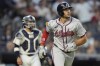 Atlanta Braves' Matt Olson watches his two-run home run, near New York Yankees catcher Jose Trevino during the fourth inning of a baseball game, Friday, June 21, 2024, in New York. (AP Photo/Frank Franklin II)